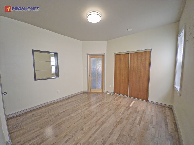 Second bedroom with accent wall